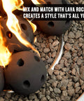 Hollow Ceramic Balls, Set of 12 Round Fire Stones Set, Black, used with lava rocks in a fire pit, showcasing heat-resistant feature