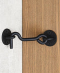 4” Privacy Hook and Eye Gate Latch Easy Lock for Barn Door, Black, installed on wood and white surface