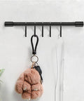 Kitchen Rail with Hooks, Pan and Pot Hangers for Kitchen Wall Mount displayed with keys and accessories on S hooks, Black aluminum.