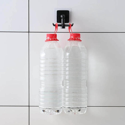Kitchen Utensil Hanger with 6 Hooks, 2 Pack Under Cabinet Utensil Holder holding two water bottles on a tile wall
