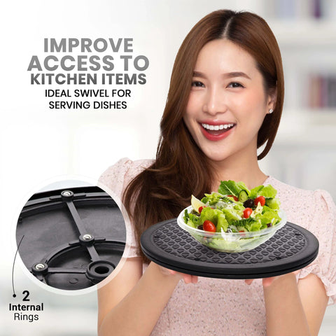 Woman holding 10 Inch Lazy Susan Turntable Organizer with salad, black durable plastic, smooth 360 rotation, ideal for serving dishes.