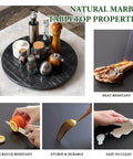 16 inch black marble lazy susan for kitchen use, natural stone rotating serving and organizer tray on a tabletop with properties.