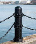 Long Black Chain Link 1/4" x 19.7 Ft, Heavy Duty Metal Porch Swing Chain for Hanging, Carbon Steel Coil tied around post by water