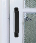 Sliding Barn Door Handles Set In Black 7.4 Inch Gate Handles Hardware on a glass door frame