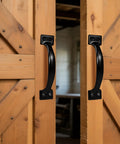 Two Pack 5.5 Inch Metal Door Handles Heavy Duty Modern Hardware installed on wooden doors