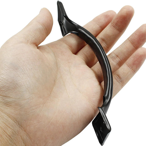 Close-up of a matte black door handle from 4 Pack 6 Inch Bow Style Metal Door Handles Door Pulls For Furniture Cabinets Kitchen Drawers Dressers Gates Vintage Barn Door Hardware Matte Black Durable Rustproof Iron Ideal For Heavy Doors And Frequent Use, shown in hand for scale.
