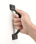 Hand holding 2PCS 6-1/2 Inch Pulls Black Door Pull Handle Metal Kitchen Cabinets Furniture Wardrobe Medicine Handle in Black Door Hardware
