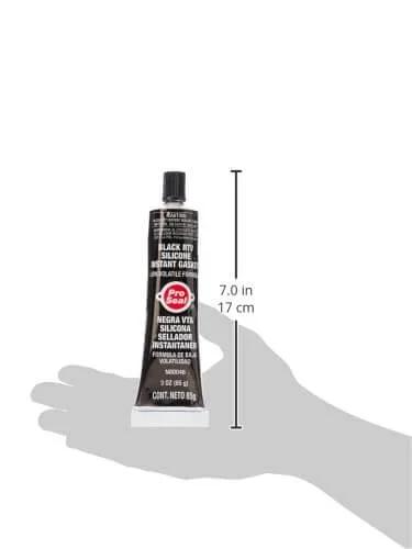 RTV Silicone Sealant For Metal Surfaces, 3 Oz Tube, Black, Oil Resistant And Sensor Safe, shown on a hand for size reference