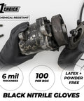 Hands wearing Black Nitrile Gloves 6 Mil Latex Free Powder Free Mechanics Automotive XL working with automotive parts.