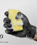 Black Nitrile Disposable Gloves 4.5 Mil Powder Free Latex Free Food Safe Exam holding a sponge with soap suds