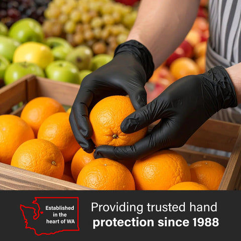 Person wearing Black Nitrile Gloves 5 Mil Silicone Free for Food Prep and Cleaning, Disposable, handling oranges in a market.