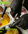 Person wearing Nitrile Disposable Gloves 4 Mil Latex Free Powder Free Black XL 100 Count while handling food with scooper