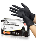 Hands wearing Black Nitrile Exam Gloves Box Of 100 Latex Free Powder Free Disposable Medical, with packaging visible in background