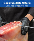 Close-up of person slicing meat wearing Black Nitrile Exam Gloves 3.5 Mil 1200 Textured Grip Latex Free Powder Free.