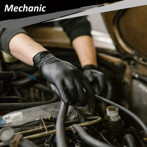 Mechanic wearing 4 Mil Nitrile Gloves 100 Count Latex Free Powder Free Food Safe For Cooking while repairing engine