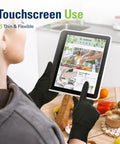 Person using tablet while wearing Black Nitrile Gloves Disposable Food Safe Latex Free Powder Free 2.5 Mil Thick For Cooking And Food Prep