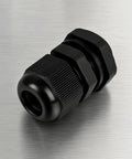 Half Inch NPT Strain Relief Nylon Cord Grip Cable Gland Black Plastic Grommet for 6-12 mm cables, on metal surface