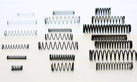 114 Piece Black Oxide Finish Compression Spring Assortment With 29 Sizes In A PP Storage Case Including Chart On Lid For Quick Identification Pro Grade Spring Steel Factory Direct For Tough Mechanical Projects