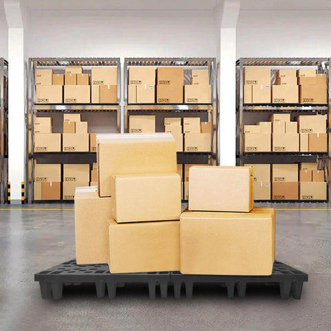 Heavy Duty Black Plastic Pallets 8 Pack Nestable HDPE Floor Pallets For Basement Storage And Shop Warehouse Garage Use Waterproof Anti Static Dust Resistant Lightweight Durable Pallets With Breathable Grid Surfaces holding cardboard boxes in a warehouse.