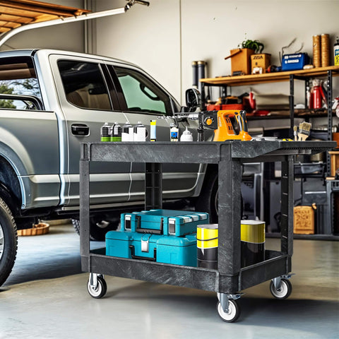 Heavy Duty 2 Shelf Plastic Utility Service Cart On Wheels With 550 Lb Capacity And 45 X 25 Inch Size Rugged Rolling Work Cart For Warehouse Garage School And Office Corrosion Resistant And Built Tough Black in garage setting with tools and storage boxes
