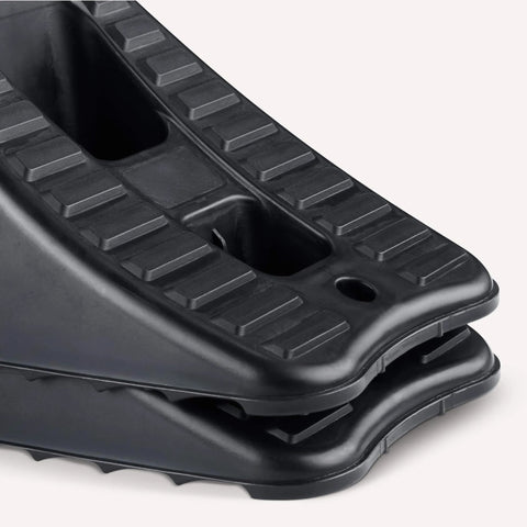 Close-up of Garage Ready Automotive Wheel Chocks 2 Pack for Secure Vehicle Parking in Home Garages, black plastic, nesting design.