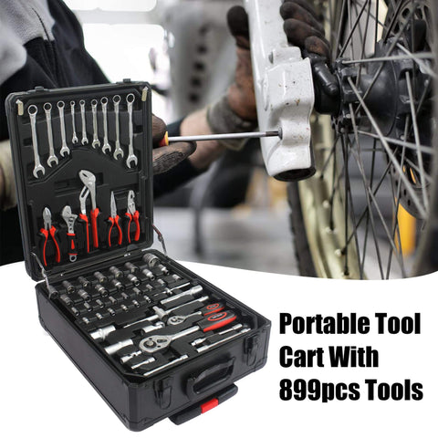 Large Capacity Repair Toolkit Set With Rolling Case For Emergency Car Repairs, Water, Electrical, And Woodworking Fixes, Designed For Gardens, Homeowners, And Handymen, With Drawer Compartments And Easy Access Tools, Black shown open next to car wheel repair.