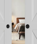 2 Inch Round Closet Door Finger Pulls 4 Pack In Black For Cabinet Doors Pocket Doors And Sliding Doors installed on white doors