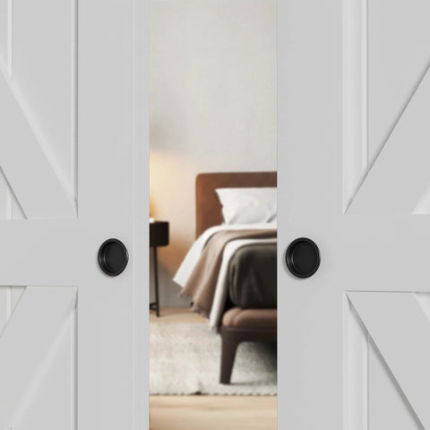 2 Inch Round Closet Door Finger Pulls 4 Pack In Black For Cabinet Doors Pocket Doors And Sliding Doors installed on white doors