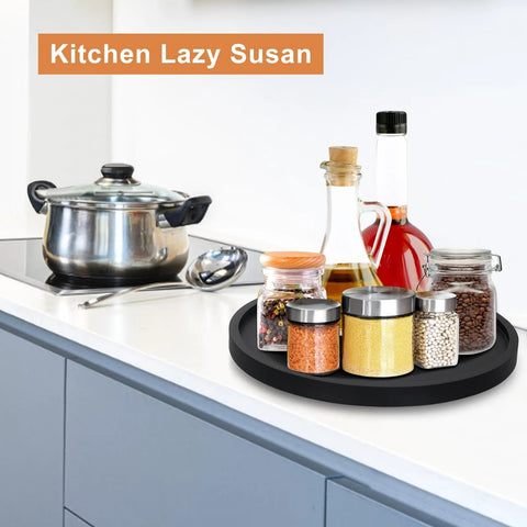 Round Wooden Bathroom Tray With 360 Degree Silent Rotation Lazy Susan Turntable on kitchen countertop with spices and jars