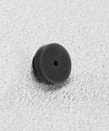 Close-up of one black rubber door silencer from 100 Pcs Rubber Door Silencers For Metal Frame Doors Anti Slam Hinge Outlet