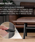 Wobble Proof Furniture Leveler Set, 30 Pack 2 Inch Black Rubber Shims For Leveling shown securing a table leg.