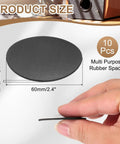 Close-up of a hand holding a black rubber spacer washer, 60mm diameter and 1.5mm thick, part of a 10-pack set for DIY use.