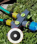 120Pcs Flat Rubber Washers Set 5 Sizes 16 18 20 25 30mm Black Sealing Washers installed on a garden hose splitter.