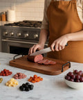 Black Side Mounted Tray Handle Set With Two Metal Pulls And Four Screws for charcuterie boards, shown on kitchen counter.