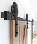 Installed Premium Black Finish Wood Double Sliding Barn Door Hardware Kit With Big Spoke Wheel Rollers, steel tracks on wall