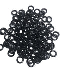Pile of 125 black silicone o-rings, shown for Bass Fishing Wacky Rigging O Rings 125 Pack Black For Wacky Tool And Neko Style Lure Rigs