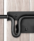 Side view of black Slide Bolt Gate Latch with Padlock Hole on wooden fence, heavy duty for outdoor use on wooden and vinyl doors.