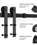 Close-up of 8.2 FT Heavy Duty Sturdy Sliding Barn Door Hardware Kit, Black, showcasing rubber cushioned stoppers and nylon wheels.