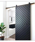 Modern interior with 2 Pack 40x50mm Black Barn Door Stopper For Sliding Doors With Flat Track Roller Limiter Rail Durable Rubber And Aluminum Construction Easy Install Modern Minimalist Style For Contemporary Homes And Workspaces installed.