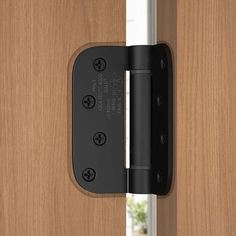 3 Pack Self Closing Door Hinges 4 Inch Black Spring Hinge With 5 Eighths Inch Radius Corner Adjustable Tension installed on wooden door