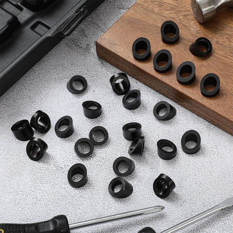 30 Degree Bevel Washer For Cable Railing In Black Stainless 3 Eighths Inch Bore, scattered on a surface and wooden block