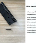 Heavy Duty Stainless Steel Door Hinges Built Like A Tank 5 Inch By 3 Inch Square Corner 304 Stainless Steel Ball Bearings Rust Proof Non Removable Pin 2 Pack For Interior And Exterior Doors with a screw on a wooden surface next to a product description.