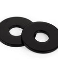 Close-up of two black-coated flat washers from the 50 Pcs 1/4 Inch Stainless Flat Washers 0.69 Inch Outer Diameter Black Coated 304 Stainless Steel For Screws And Bolts set