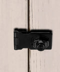 Flat black stainless steel hasp lock installed on cabinet, part of Two Pack 2.5 Inch Hasp Lock With Keys Flat Black Stainless Steel Cabinet Latch.