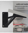 2-Piece Folding Bracket And Hidden Cabinet Hinge Set installed on table, showing stability and upturned at 80 degrees, black steel.