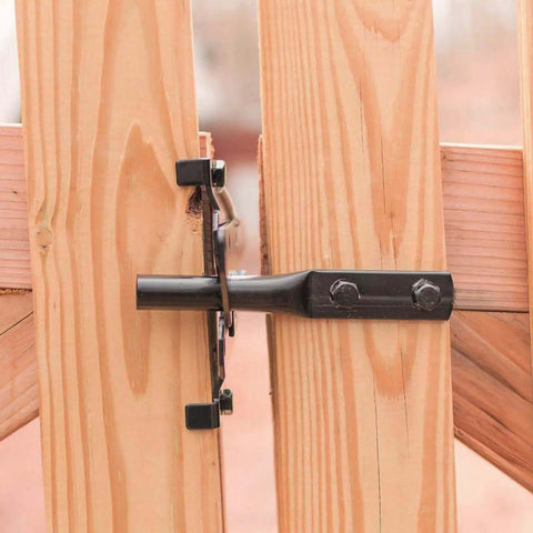 Black finish Built Tough Post Mount Gate Latch with Self Latching Fingertip Release installed on wooden garden fence for safety