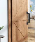 Sliding Barn Door Handle Black Steel, 7.5 Inch Length installed on wooden sliding door in home interior