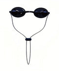 Black swim goggles with adjustable strap displayed against a white background.