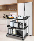 Heavy Duty 3 Tier Utility Cart With Wheels For Restaurant And Warehouse, 420 Lb Capacity, Lockable Wheels, Rubber Hammer Included, Durable Aluminum And Polypropylene Build, Mobile Food Service Cart For Kitchen Black in use