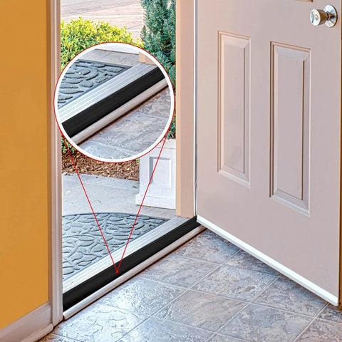 Open door showing 2 Pcs 36 Inch Vinyl Replacement Insert for Adjustable Height Aluminum Thresholds with Seals 1-5/16 x 3/8 Vinyl Replacement Insert installed